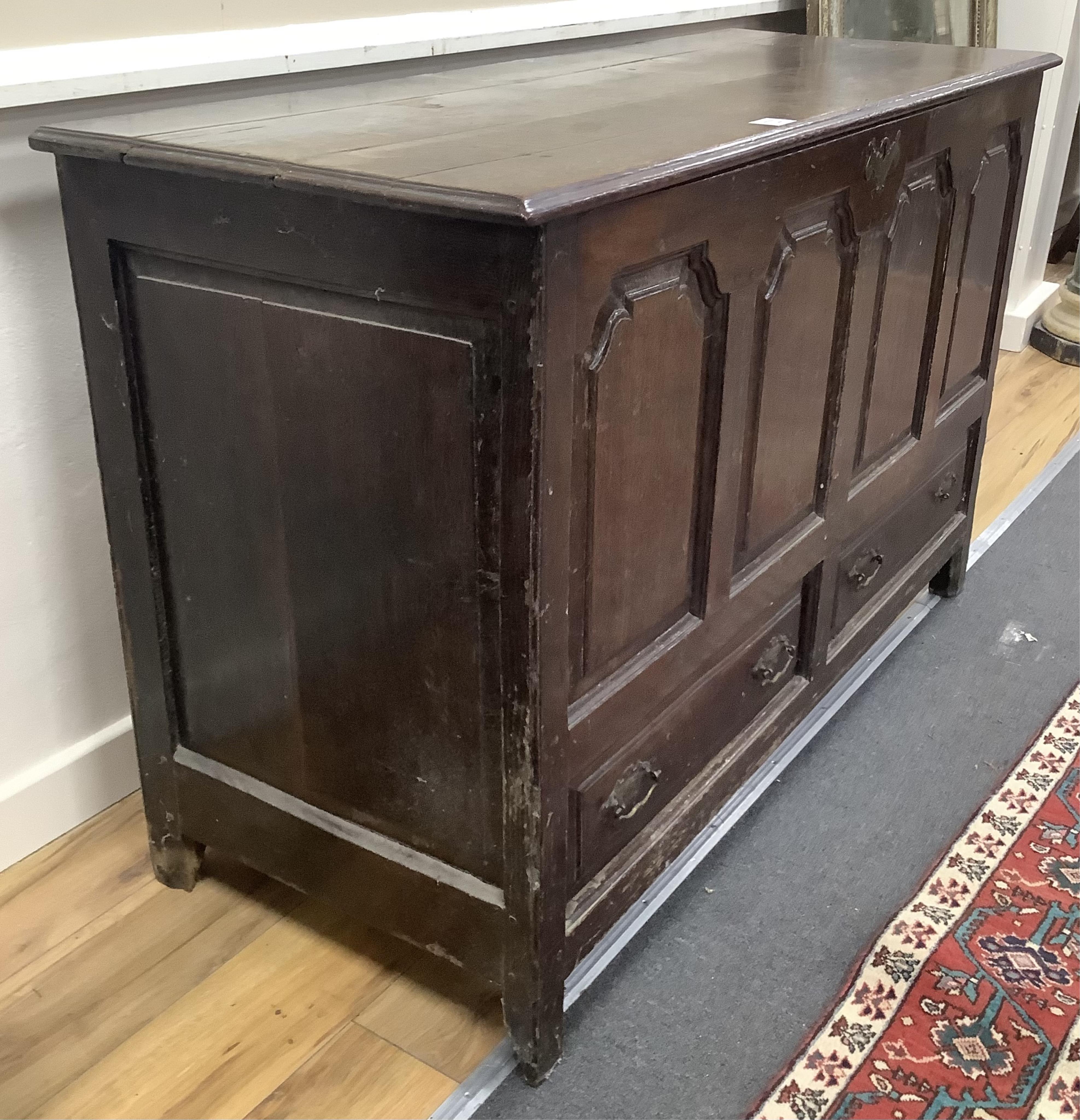 A mid 18th century North Wales oak mule chest, width 136cm, depth 53cm, height 84cm. Condition - poor